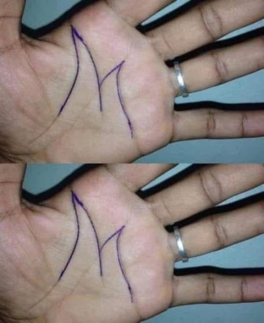 THIS IS WHAT THE LETTER “M” REALLY MEANS in hand