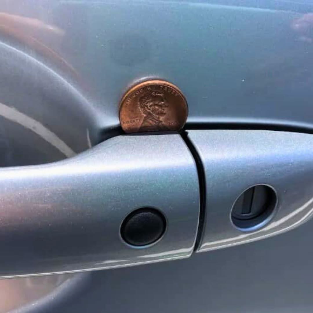 If You Ever Notice a Penny in Your Car Door Handle What It Could Signal and Why Staying Alert Matters