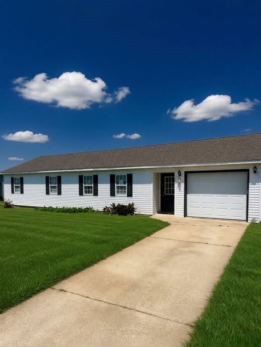 Quiet Opportunity on a Simple Kennett Street: The Affordable Single-Level Home With Attached Garage