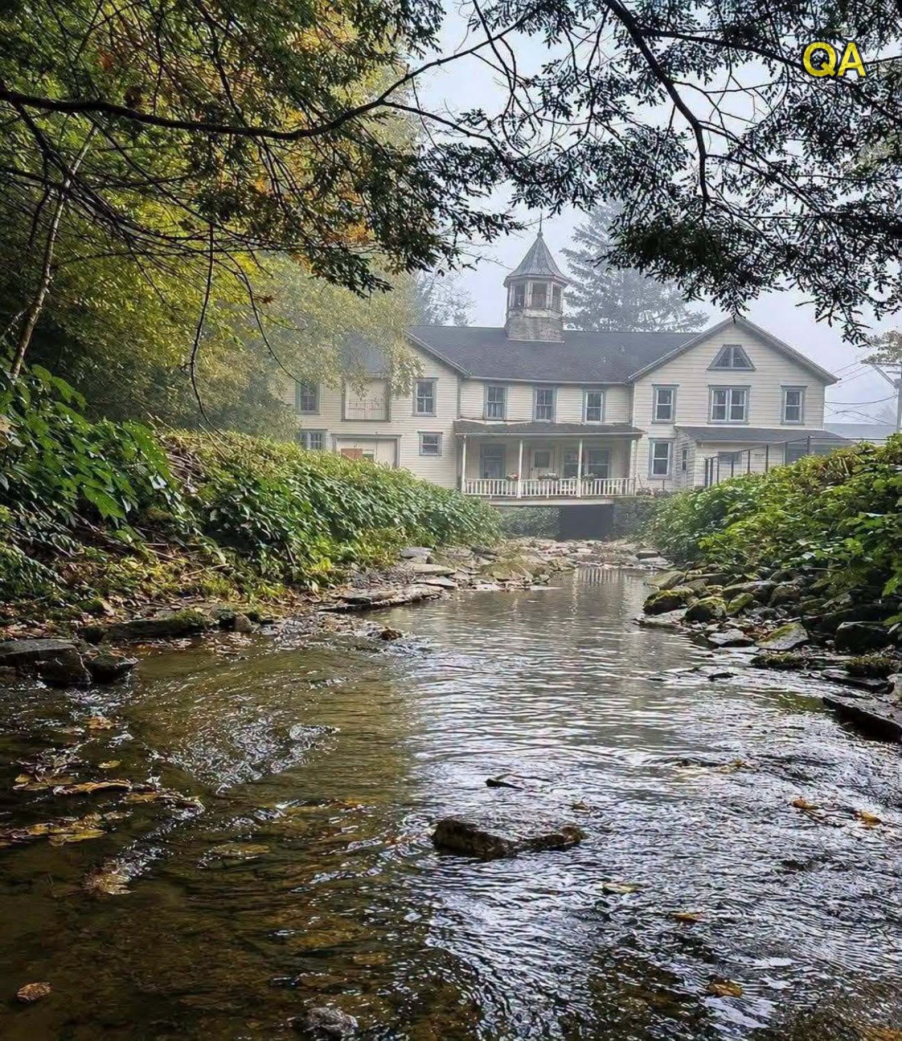 This Stunning Old House Sits Over a Peaceful Creek—and the View Is Simply Magical